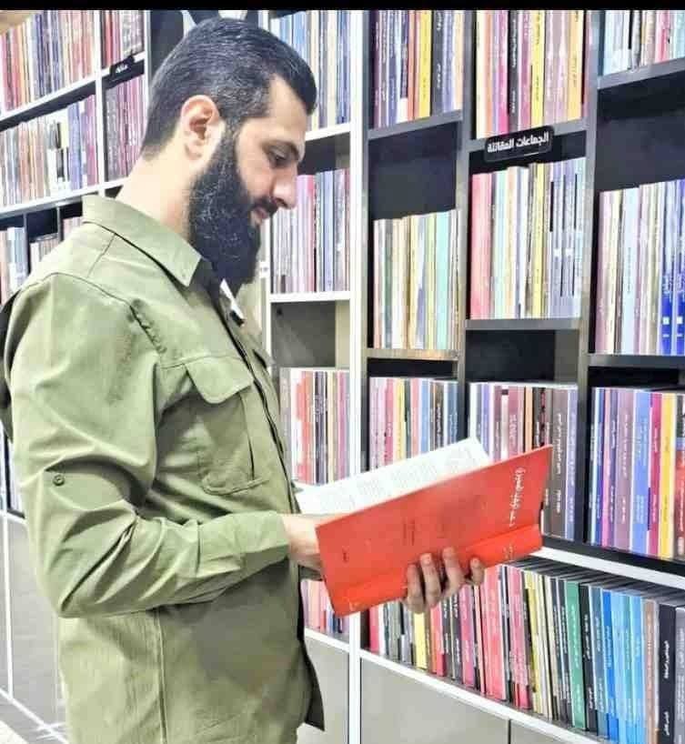Me reading my favorite feminist literature book at the bisexual vegan coffee shop with my woke hijabi amputee woman of color friend