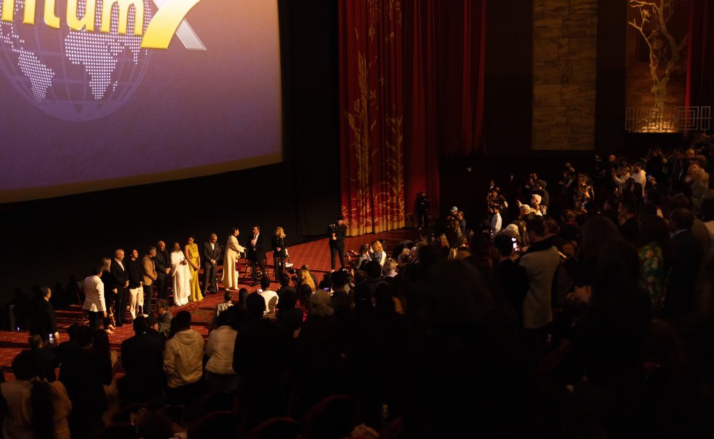 Gurudev's tweet photo. Turn back and see all of life is a drama of so many different emotions. When you are a witness to this, then we operate from another place, one that unites in a world riddled by so many conflicts. Cinema entertains but also steers the mindset of young people. In Hollywood, with industry stalwarts speaking before a global film premiere. @iamredham @Esai_Morales Mark Pennell