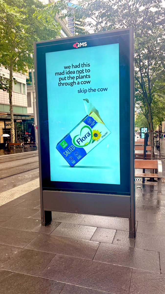 New ad for Flora salted vegan butter shown in Sydney CBD. „We had this mad idea not to put the plants through a cow.“ The future is vegan 🌱 #vegannewcastle #veganaustralia #skipthecow