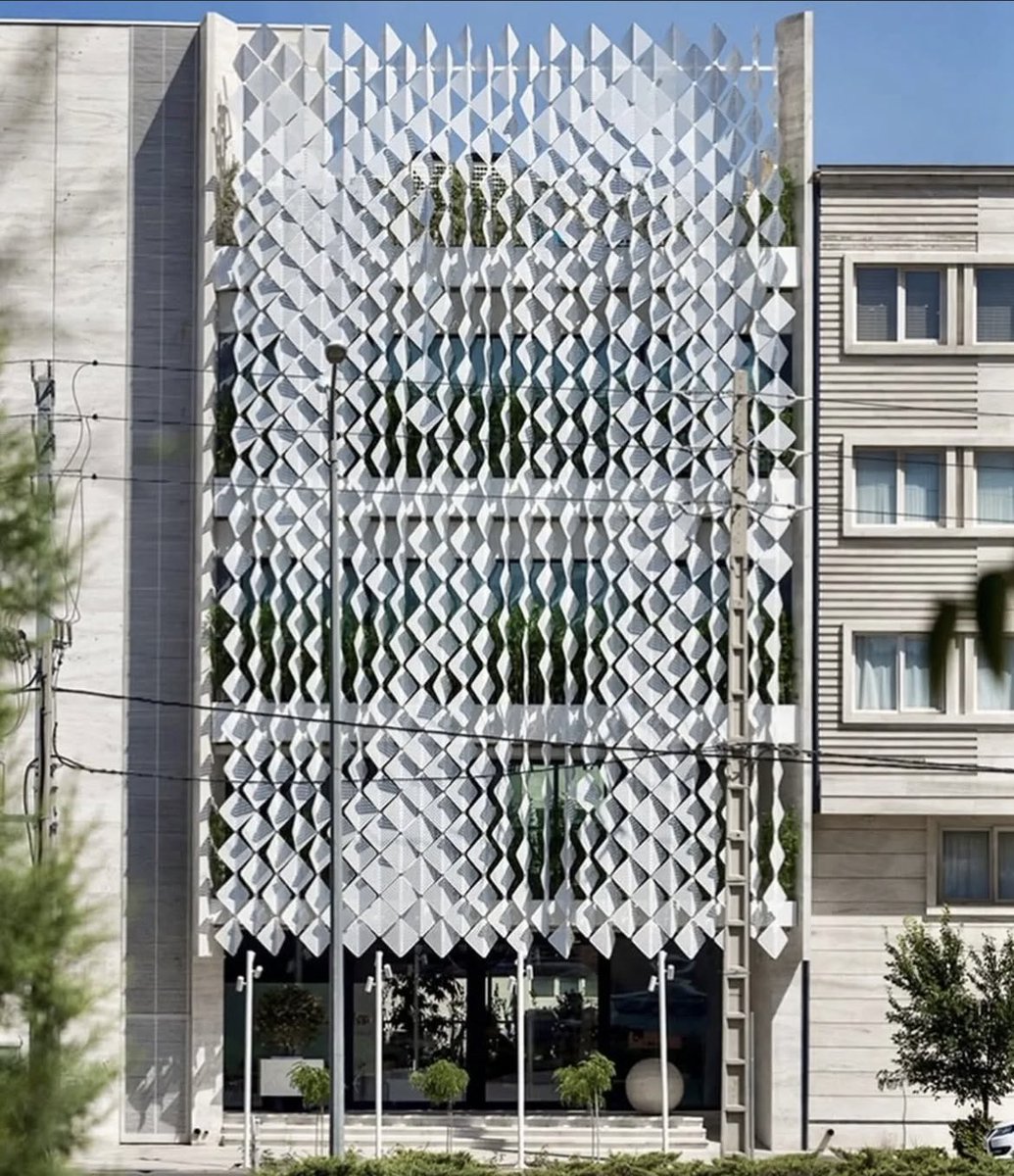 SustainableTall's tweet photo. 594 perforated aluminium shading elements, protecting this sports and cafe building in Iran

By architects Ali Sodagaran and Nazanin Kazeroonian https://t.co/xYI6HmJDIe