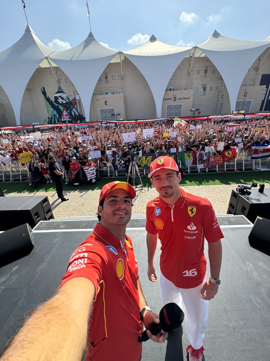 ScuderiaFerrari's tweet photo. The final fan forum selfie as teammates ❤️ 📸 

#AbuDhabiGP 🇦🇪 #F1 https://t.co/BNb26jyXwp