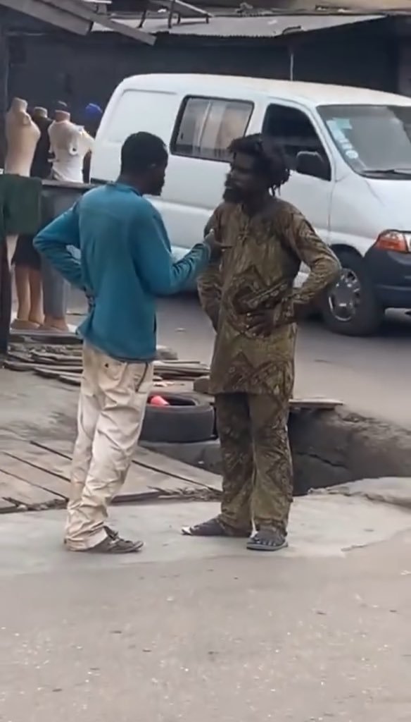 oxygist's tweet photo. Trending video of two challenged men that were spotted having a discussion in the middle of a street.

I wonder what they are discussing 🤔

(Congratulations Pooja Sinach Moses Bliss #PastorChris Naira) https://t.co/aKM7Q7DK4y