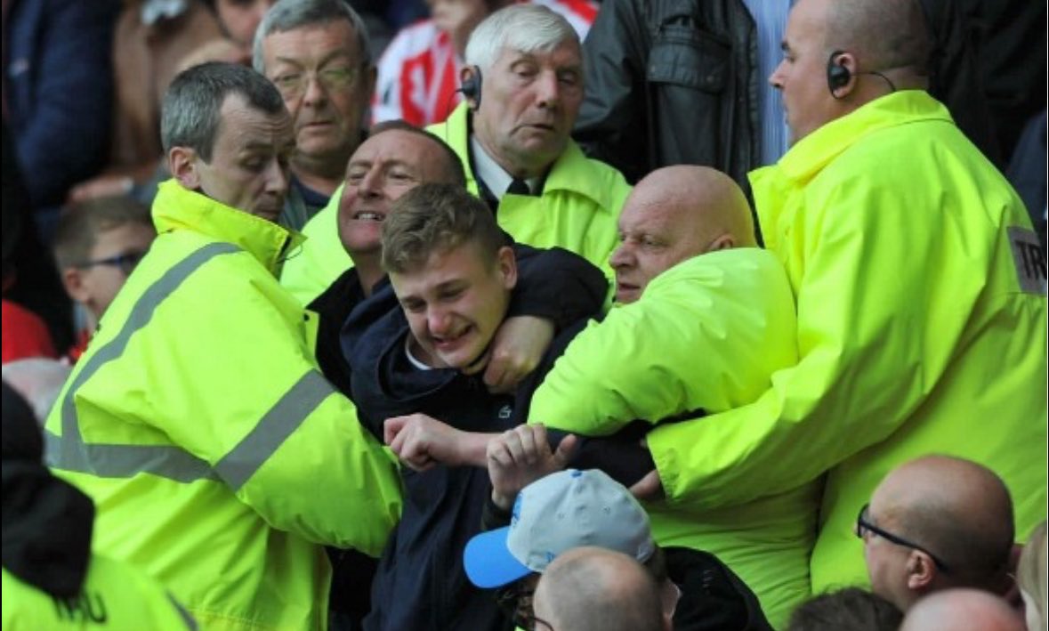 Awful scenes at Wigan as Stewards make fans watch the game #wafc