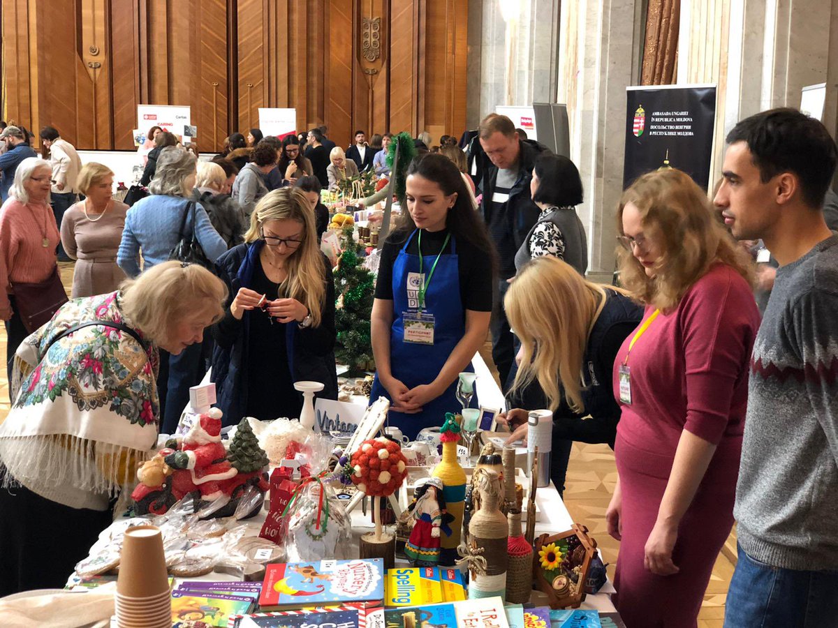 UNDPMoldova's tweet photo. At the International Charity Bazaar, every purchase brings hope! Joining 20+ embassies to turn smiles into change. Discover unique traditions, artisan crafts &amp; delicious treats. Be part of ❄️story! Every contribution counts! https://t.co/WVCt4Nac9h