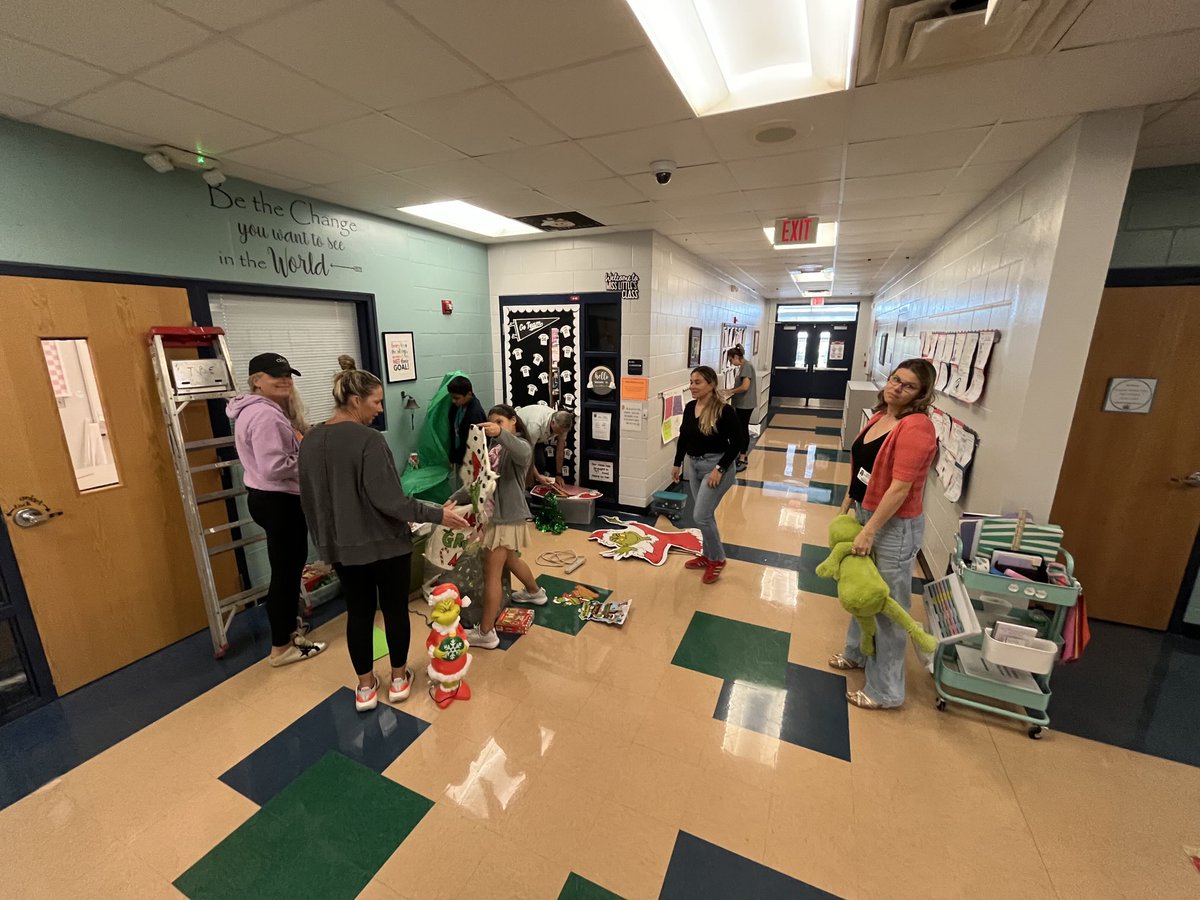 Skudnig's tweet photo. Special thanks to these Holiday Helpers who transformed the 2nd grade hallway into Grinchmas! Parent and Student volunteers synergized to create whoville. #ThinkWinWin @MissLittleTBE @mrsarmas_Class @miss_morell_tbe #MrsBall #MrsHeitman @TommieBarfield https://t.co/RyLzfmZCxS
