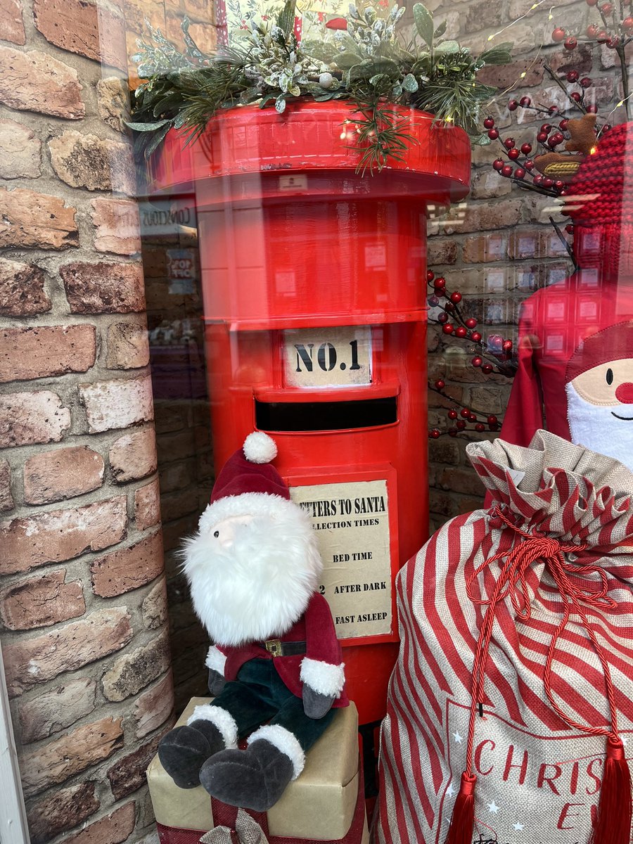 SoOccasionNow's tweet photo. For #PostboxSaturday I quite like this #festive and bright character spotted in #MerlinsWalk in #Carmarthen #Caerfyrrdin https://t.co/Yeq2750GMt