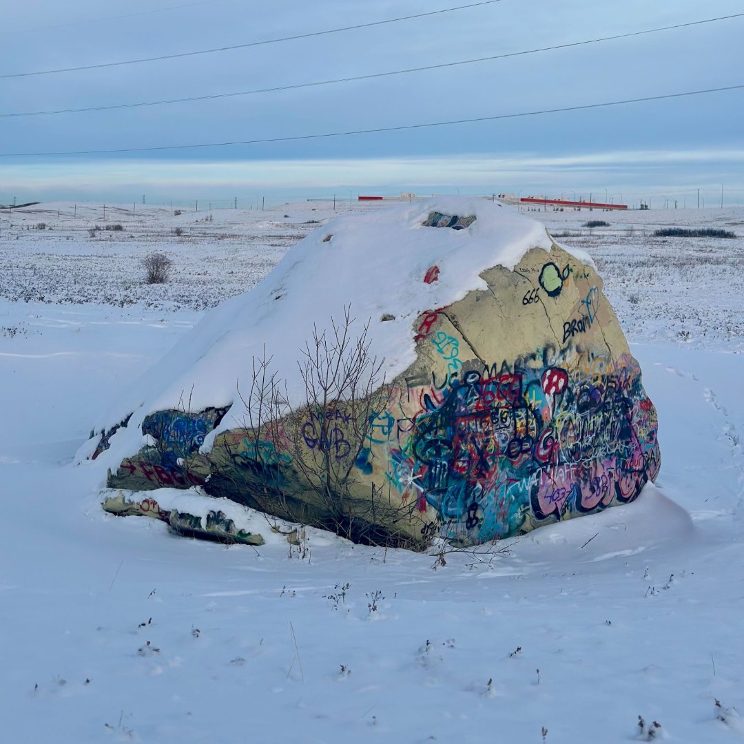 savenosecreek's tweet photo. Snow might be covering some of the graffiti but there are so many vulgar tags on this Glacial Erratic that we've lost the ancient pictographs that were once on this Natural Monument. We hope one day to get permission to restore this rock. #SaveNoseCreek #SNCerratic #yyc #abpoli https://t.co/FLNLNP2Ki4