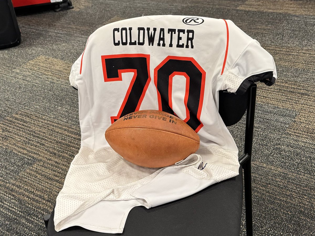 TonyTQuach's tweet photo. The Coldwater football team continues to honor the memory and life of the late Cale Wenning ๐
Goes without saying these Cavs plan to win for him today against their third-ever state final game against Kirtland.
#CWStrong #70 ๐ค๐งก https://t.co/ywYv0ToLUo