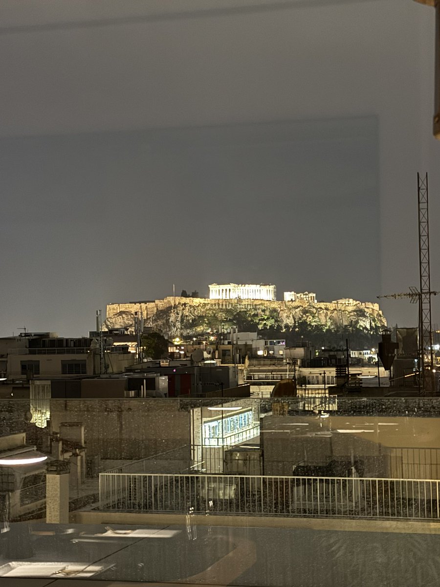 raford3's tweet photo. Rainy night in Athens, but having dinner at a rooftop restaurant has a great view of the Acropolis. https://t.co/VkCyUFMffr