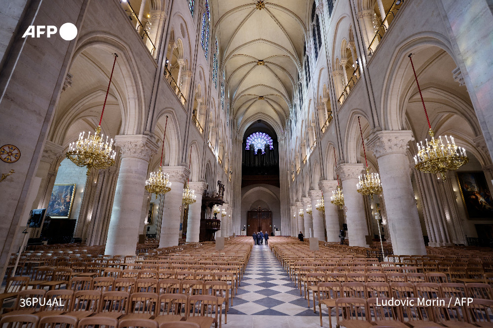 AFP's tweet image. #UPDATE France prepared to reopen Notre Dame cathedral after a half-decade closure during a ceremony attended by dozens of world leaders celebrating the rebirth of the Paris landmark ravaged by a devastating fire.

u.afp.com/5CXo by @Stuart_JW @ADAMPLOW