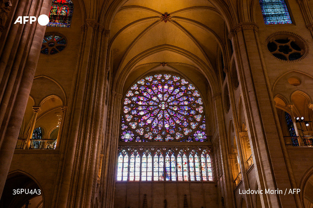 AFP's tweet image. #UPDATE France prepared to reopen Notre Dame cathedral after a half-decade closure during a ceremony attended by dozens of world leaders celebrating the rebirth of the Paris landmark ravaged by a devastating fire.

u.afp.com/5CXo by @Stuart_JW @ADAMPLOW