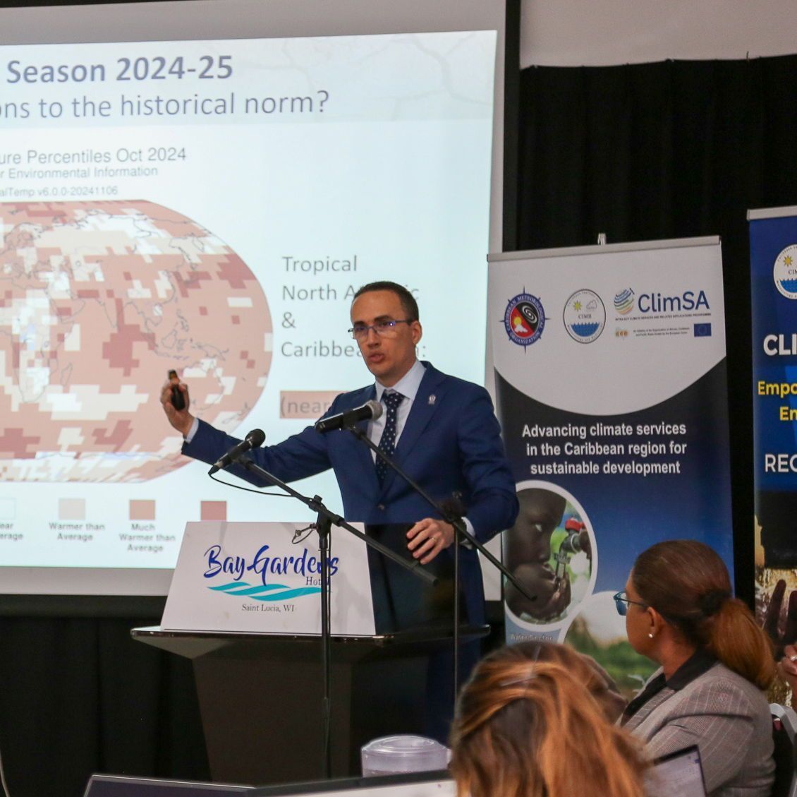 CIMHbb's tweet photo. At #CariCOF, Dr. Cedric Van Meerbeeck, Climatologist at the CIMH forecasted a warmer-than-usual cool season running from December to February. These varying patterns highlight the urgent need for stronger climate resilience in the Caribbean! 🌍🌡️
#ClimateAction #CaribbeanClimate https://t.co/qWQXvkihjs