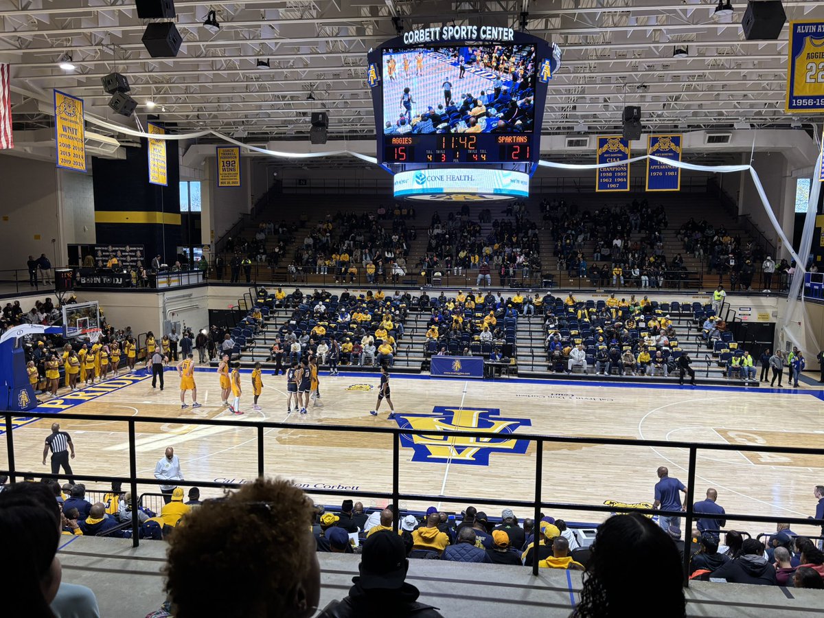 MitchCroatt's tweet photo. Had a great time at the @UNCGBasketball vs @ncatbasketball game today. Brought a bunch of @GreensboroNano researchers to the game, and since we are all with both @UNCG and @ncatsuaggies we were guaranteed a win! https://t.co/9uTeJgEqsx