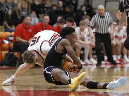 As Sheldon Aninagyei Bonsu ran into Huntley's gym before Friday night's Fox Valley Conference game against Hampshire, his warmup jersey got snagged on a door. dailyherald.com/20241206/boys-…