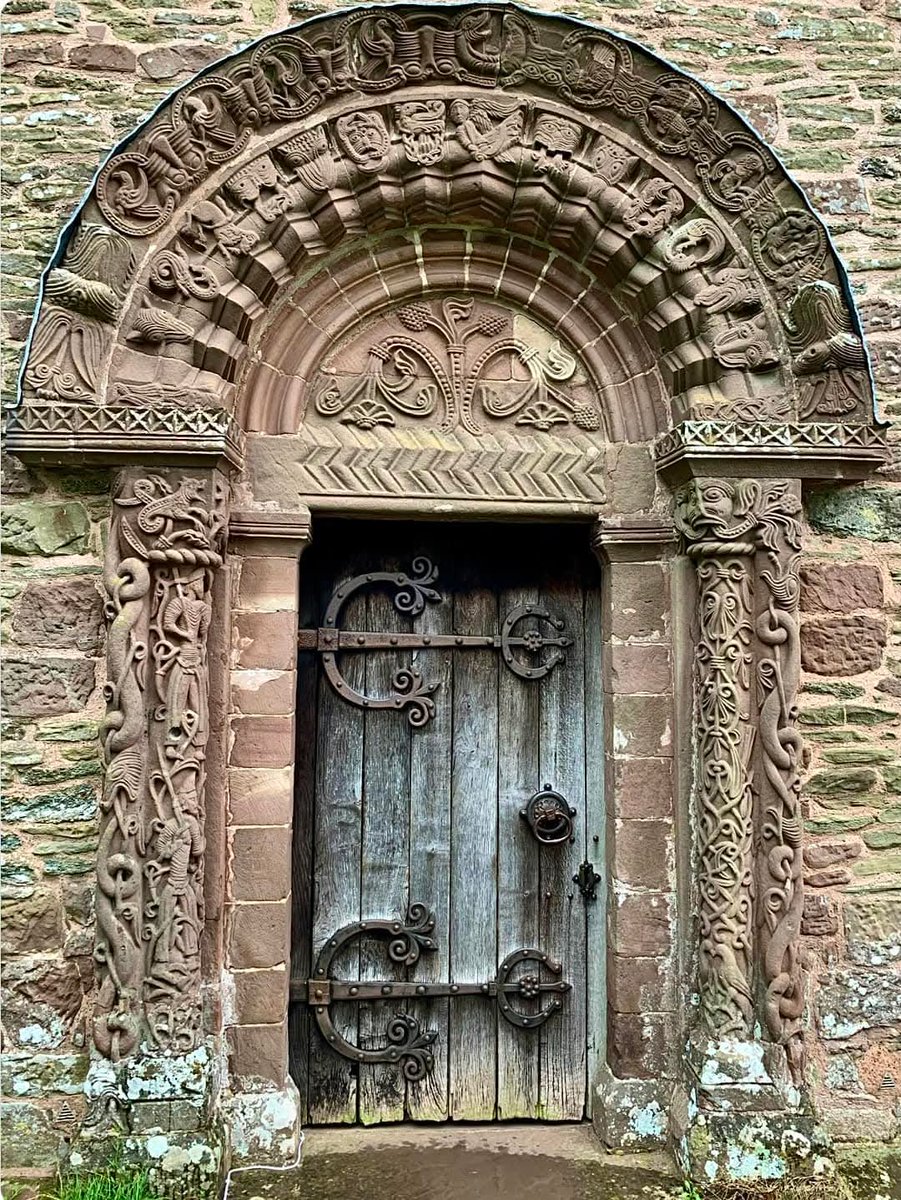 histories_arch's tweet photo. The South Doorway of the Church of St. Mary and St. David, located in Kilpeck, Herefordshire, is a striking example of 12th-century Romanesque architecture. This Grade I listed building is renowned for its intricate and symbolic stone carvings, which adorn the doorway. The detailed reliefs depict various biblical scenes, mythical creatures, and figures, showcasing the skill and artistry of the craftsmen who worked on the church. The doorway remains one of the most celebrated features of this historic structure, drawing attention for its unique and decorative design.

Built in the early 12th century, the church stands as a testament to the Romanesque style, characterized by its rounded arches and heavy, solid construction. The South Doorway, in particular, is notable for its elaborate sculptural work, which includes both religious motifs and elements of the fantastical. The carvings likely had both decorative and didactic purposes, conveying moral lessons to the illiterate congregants of the time through visual storytelling.

Today, the Church of St. Mary and St. David in Kilpeck continues to attract visitors and historians interested in medieval architecture and art. Its status as a Grade I listed building ensures the preservation of its historical and cultural significance. The South Doorway, with its remarkable carvings, remains one of the finest examples of Norman church architecture in England.

📷© Kevin Wilbraham

#archaeohistories
