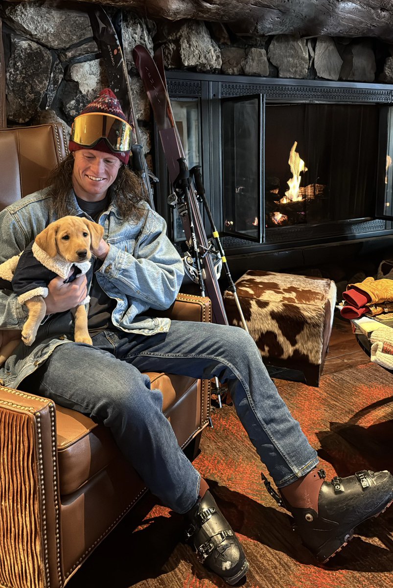 Ski in Jeans and hold a puppy wearing a Jean jacket day <a href="/jhski/">Jackson Hole</a>