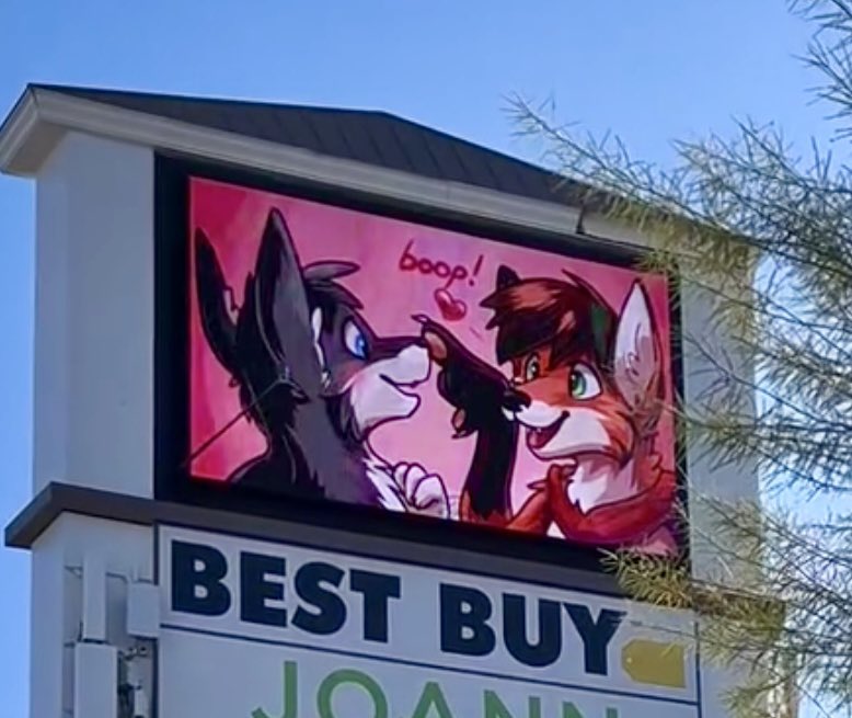 VegasIssues's tweet photo. A hacker in West Vegas turned a shopping center display into a “furry” slideshow. 💀 https://t.co/KDtgGzFjZm