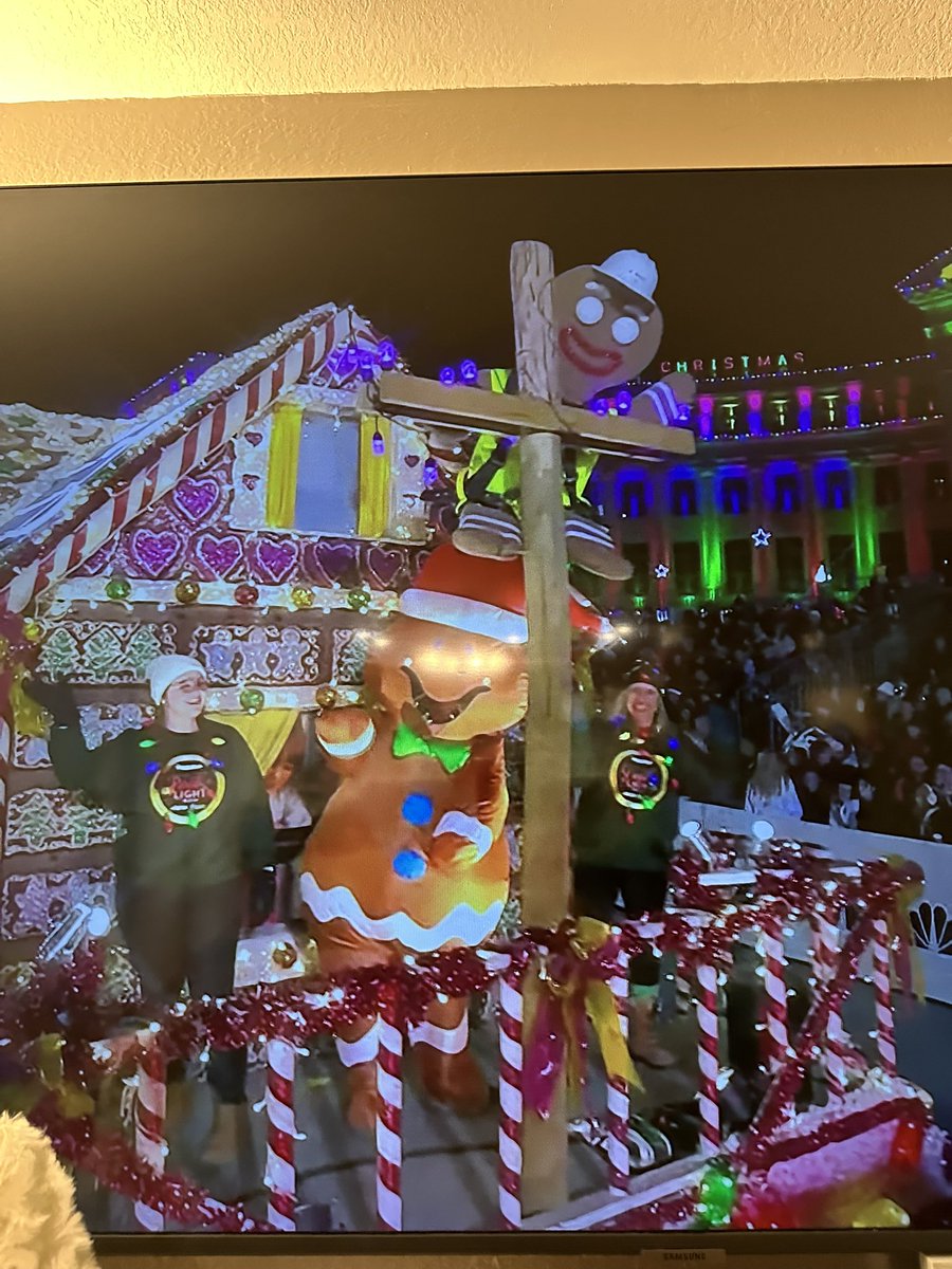 BobbyFlorio's tweet photo. Hey @CityofDenver and @xcelenergy who thought it was a good idea to have the gingerbread man climbing a cross in the Christmas parade? (Yes I know it’s a power line but you know what it looks like) #denver #Christmasparade https://t.co/GPRYV0NWuG