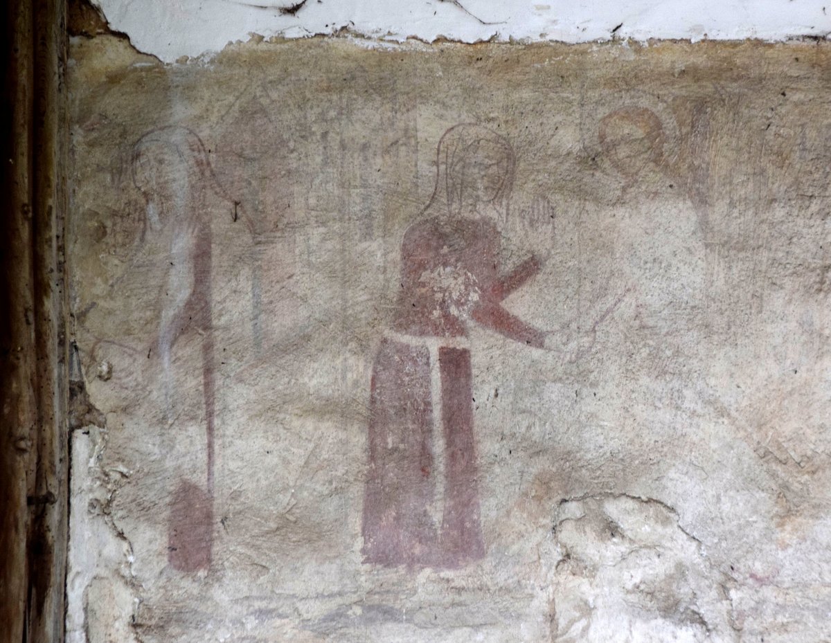 Images telling the story of the conception of Mary were heavily proscribed by the 16th Century reformers, but one at Potter Heigham in Norfolk survives - just. On the left, the elderly St Anne stands under the Golden Gate at Jerusalem and tells St Joachim she's pregnant. He's