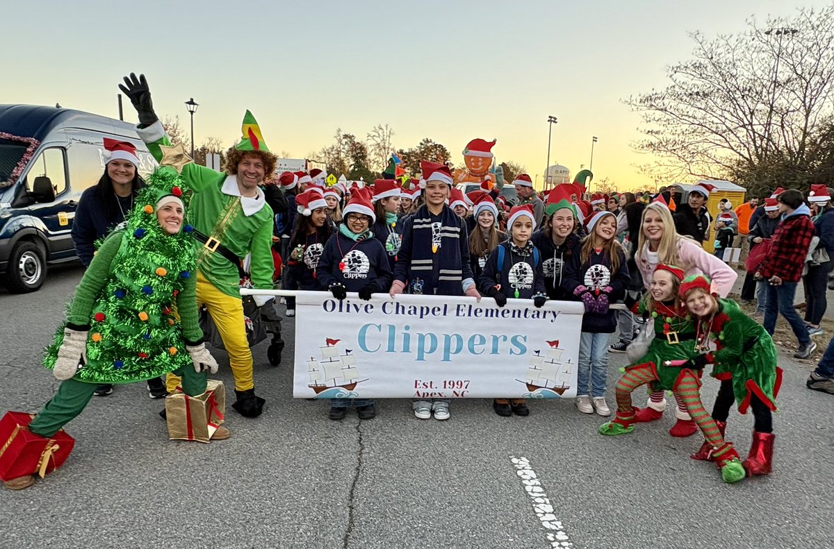 ErinKelleyMay's tweet photo. OCE was in our first Apex Christmas Parade! We had the BEST time! Thank you to the amazing staff, students, and volunteers!  It was the best! ❤️🎄🎉 @OliveChapelElem https://t.co/FEBq79ejPg