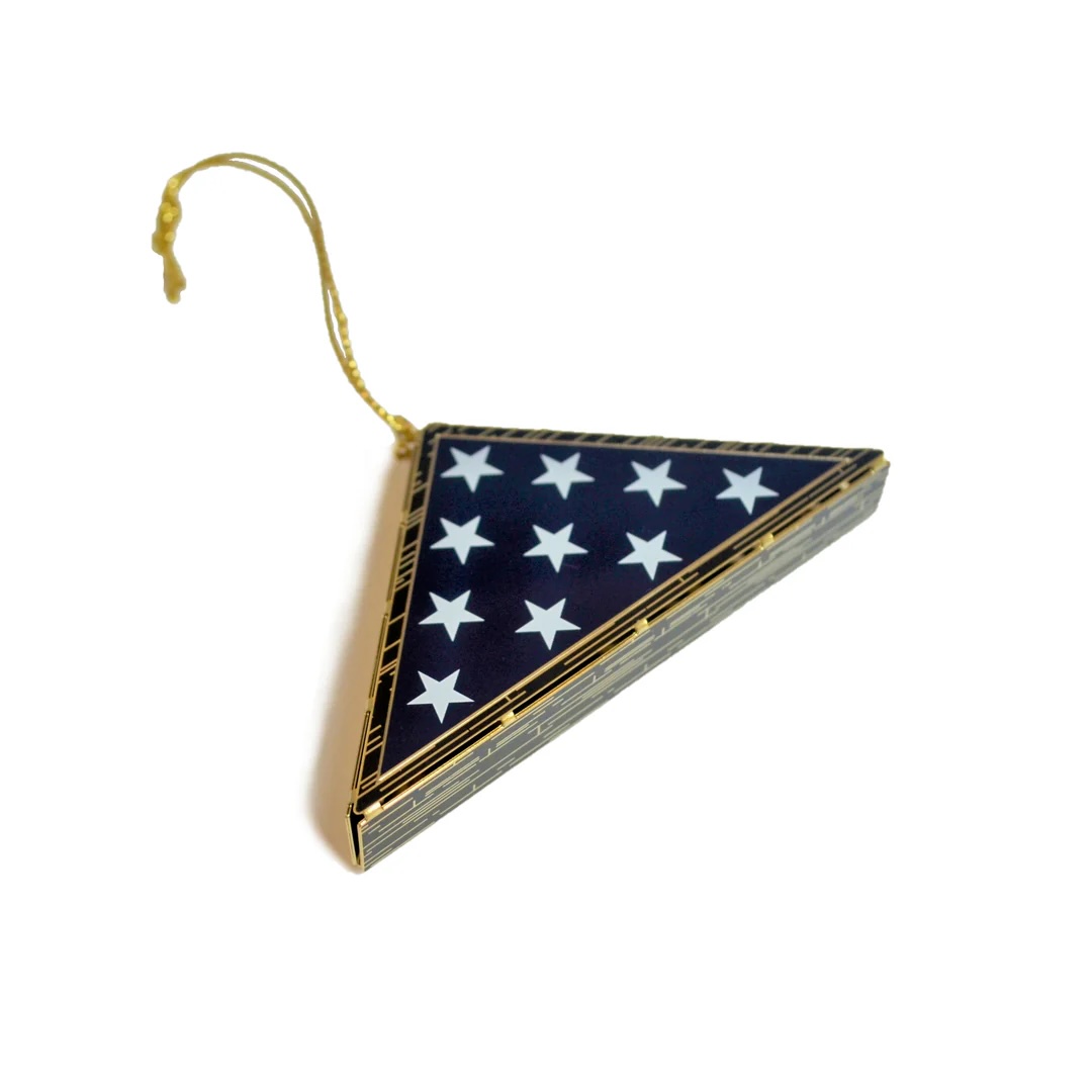 TAPSorg's tweet photo. 🎄 Shop with purpose this holiday season!

From meaningful ornaments like this folded flag to apparel and gifts, every purchase from the TAPS Store supports those grieving the death of a military loved one. ❤️

Explore the collection: https://t.co/r5e9KRyxIQ https://t.co/hahSSHrQE5
