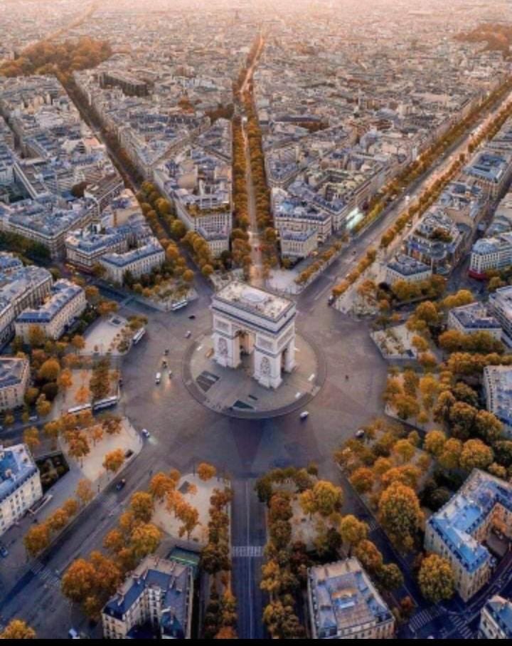 The Faisalabad Clock Tower and Paris's Champs Élysées are like siblings from different countries!