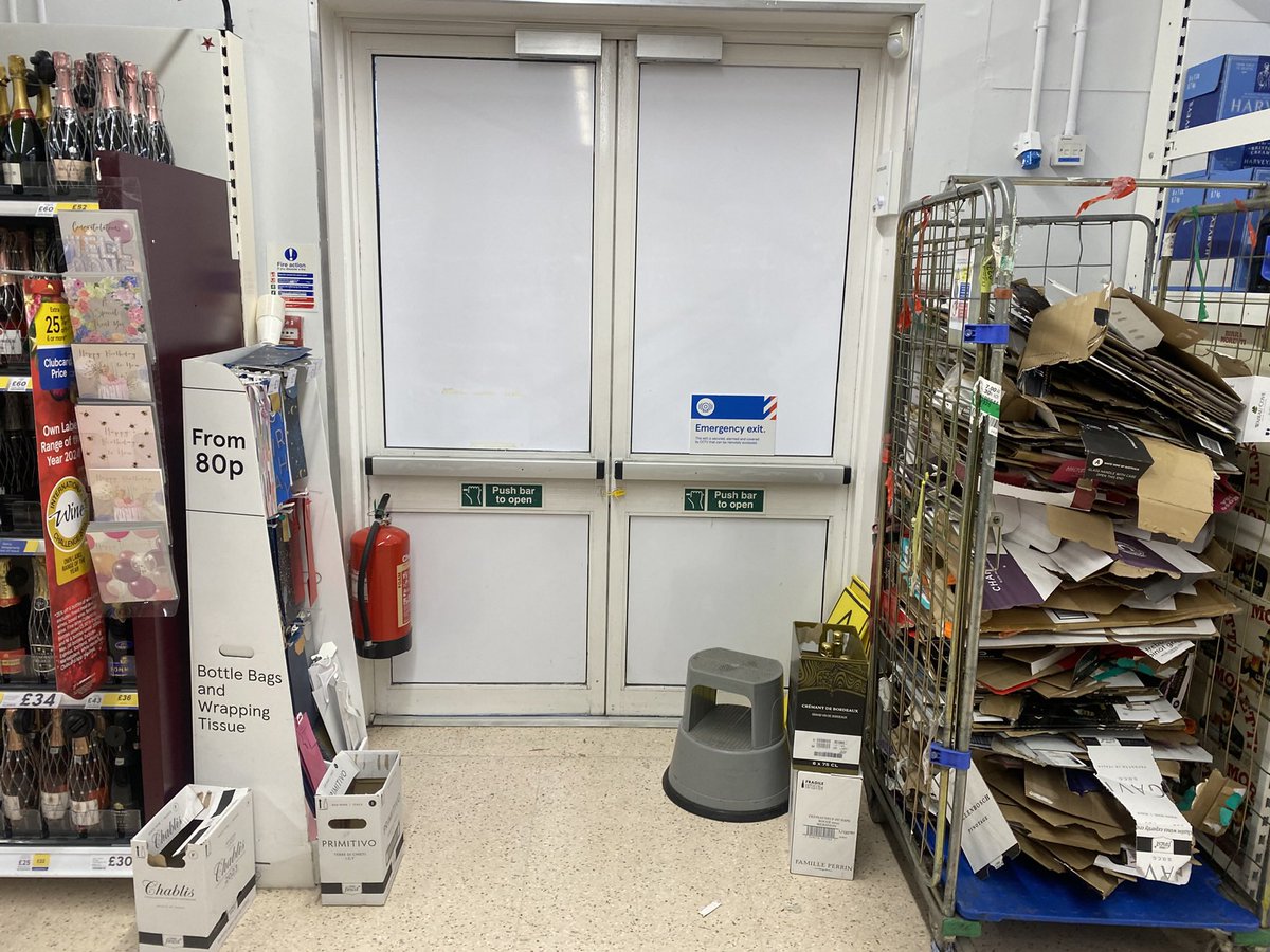 yanikdude's tweet photo. Visited @Tesco #ashbydelazouch yesterday and saw the fire exit blocked with many items. Highlighted to customer service desk, call went  out for duty manager and nothing had been done by the time I had left 20mins later.  No excuse for putting peoples safety at risk. https://t.co/83uLH9hNHG