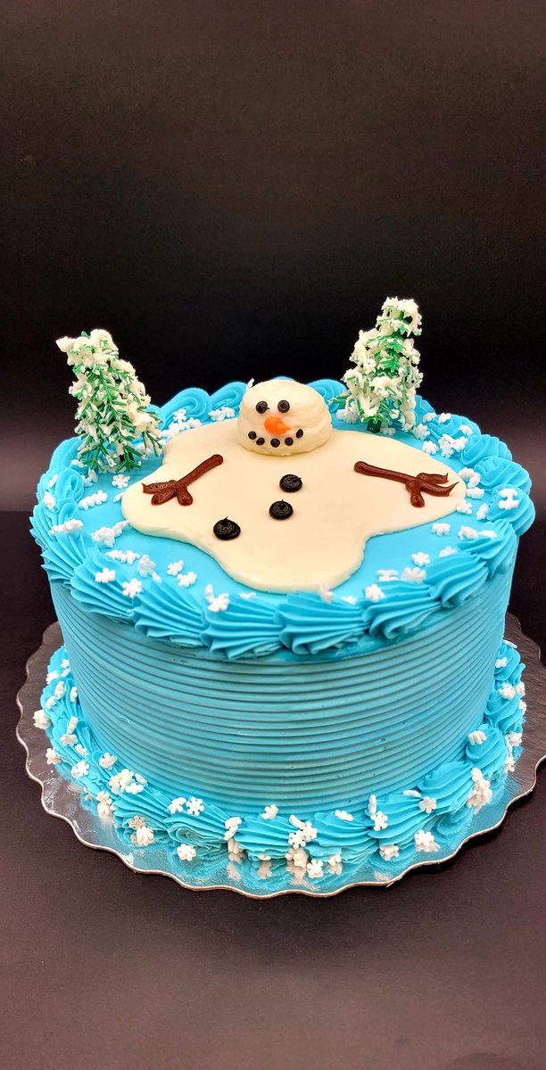 He looks surprisingly happy despite the circumstances. For curious folk it's white cake inside with a gooey caramel filling.