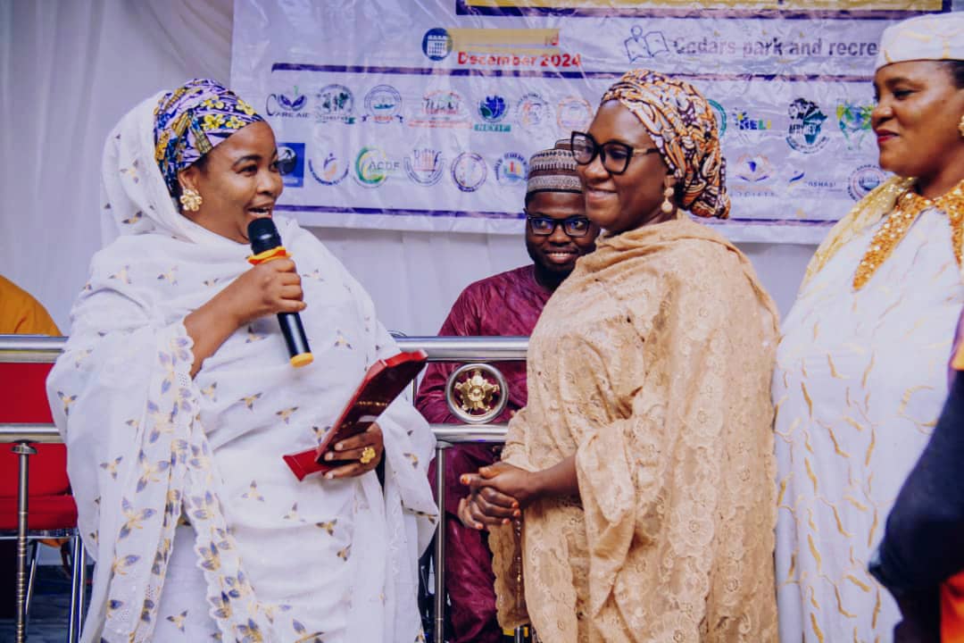 portrait_child's tweet photo. HONORING EXCELLENCE!
Our Executive Director (Dr. Zarah Yusuf Ahmad) was recognized with a prestigious award from Yobe State Disabilities Working Group &amp; Joint National Association of Persons with Disabilities on International Day for Persons with Disabilities! #PLCI https://t.co/eDyyI57sCF