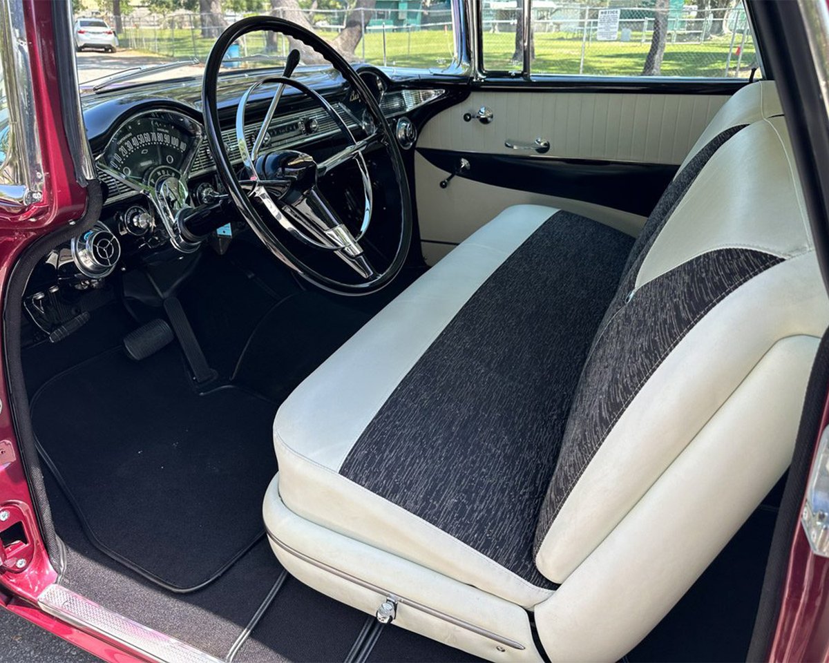 Barrett_Jackson's tweet photo. The recipient of a meticulous five-year #restoration, this 1956 @Chevrolet #NomadWagon is finished in Dusk Plum over India Ivory and powered by a period-correct authentic 265/195hp #V8 engine with a 4-barrel carburetor mated to a 2-speed Powerglide automatic transmission. https://t.co/JYfzBQ3RlD