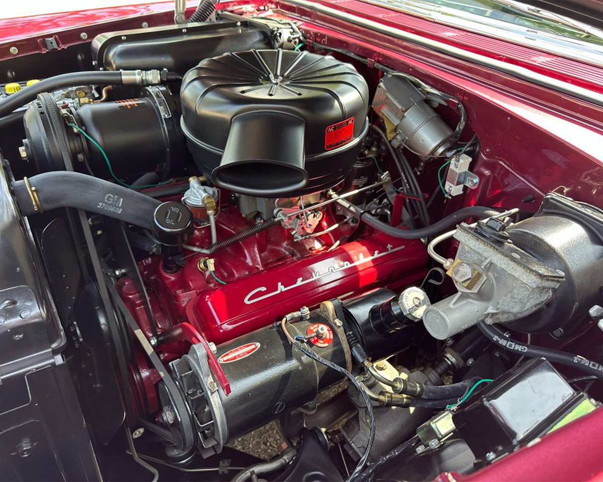 Barrett_Jackson's tweet photo. The recipient of a meticulous five-year #restoration, this 1956 @Chevrolet #NomadWagon is finished in Dusk Plum over India Ivory and powered by a period-correct authentic 265/195hp #V8 engine with a 4-barrel carburetor mated to a 2-speed Powerglide automatic transmission. https://t.co/JYfzBQ3RlD