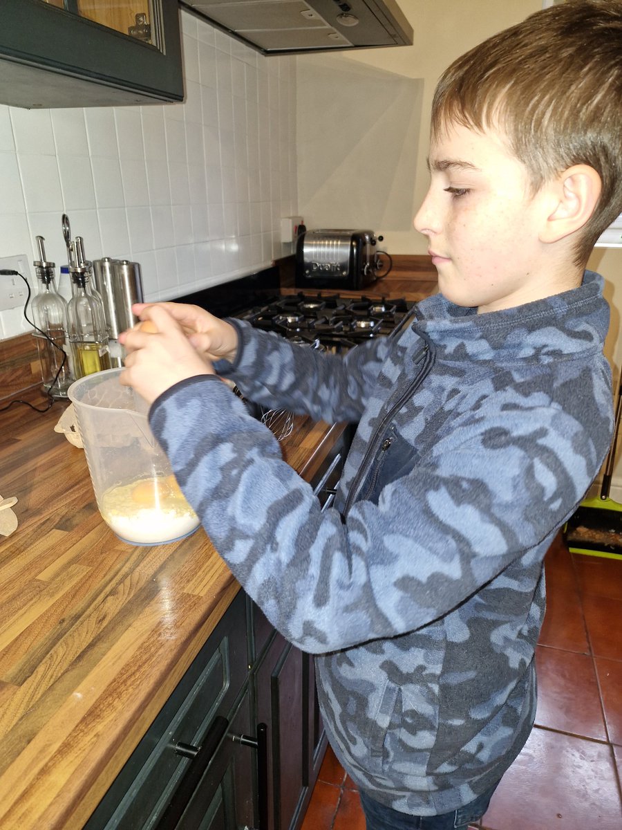 dawnmonk3's tweet photo. Matthew ticked off number 19 today with a roast pork, vegetables, home made gravy and Yorkshire puddings. It was lovely. I think Alex is on  his 4th pudding! @TrinityAcadStE https://t.co/SZPSjITdtc