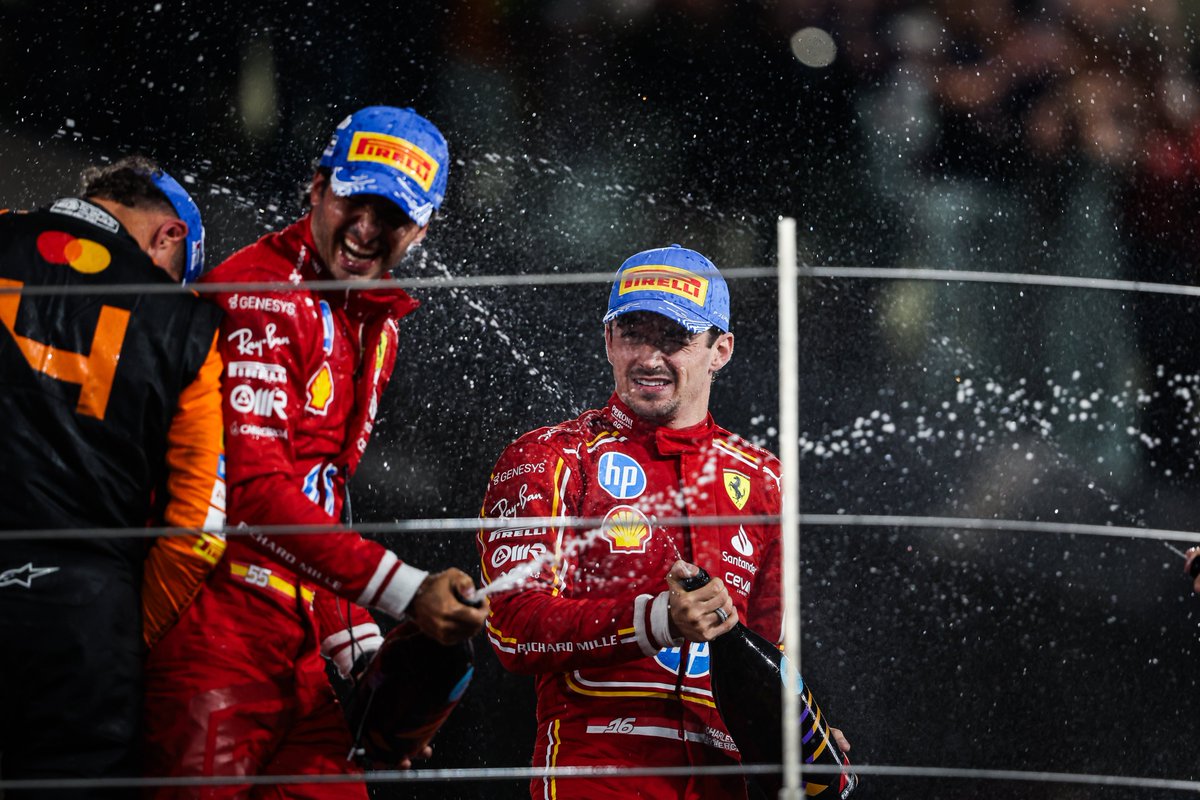 ScuderiaFerrari's tweet photo. One last podium in red together 🏆🍾

#AbuDhabiGP 🇦🇪 #F1 https://t.co/fNgLZsFBOO