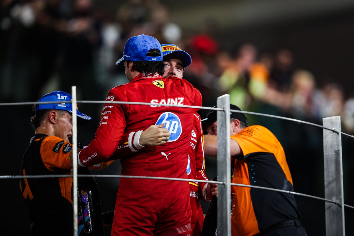 ScuderiaFerrari's tweet photo. One last podium in red together 🏆🍾

#AbuDhabiGP 🇦🇪 #F1 https://t.co/fNgLZsFBOO