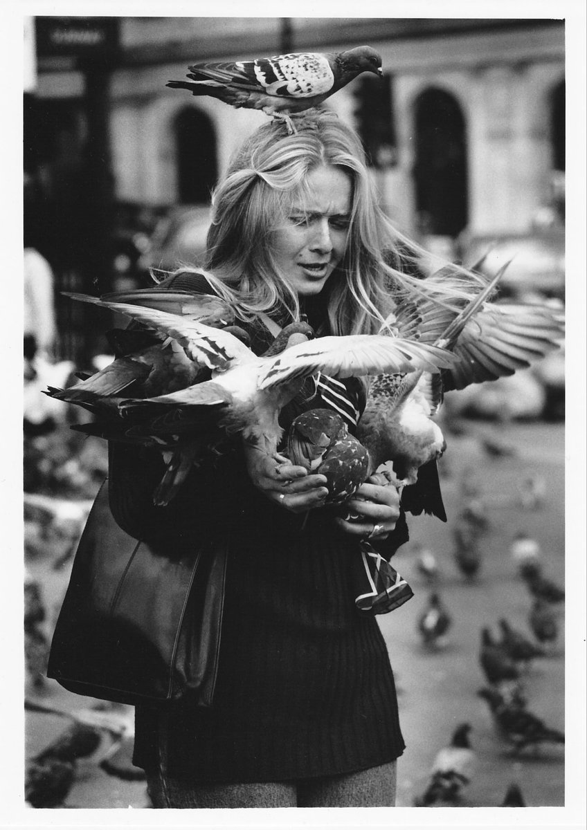 Holaczech's tweet image. #CapturedinTime: Do you recognize this young lady from 1997? I recently discovered an old photograph I took in Trafalgar Square around 1997. The young lady in the picture was likely unaware that I captured this moment, and I thought she might like to see it after all these years.
