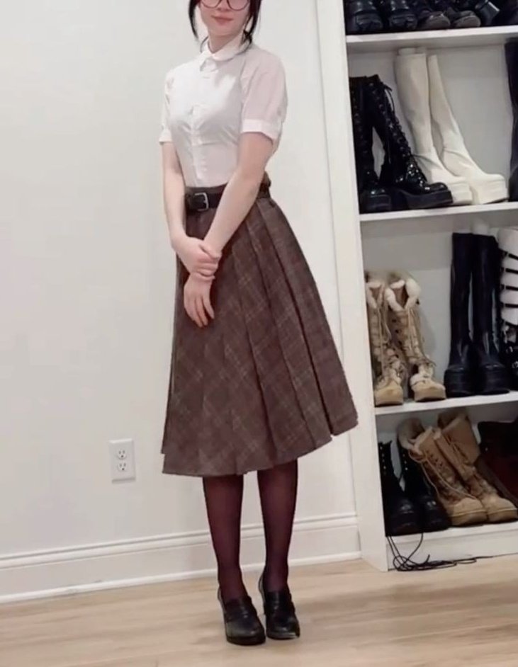 She doesn't dress like a grandma! 💦

It's just modest clothes, and she likes them.