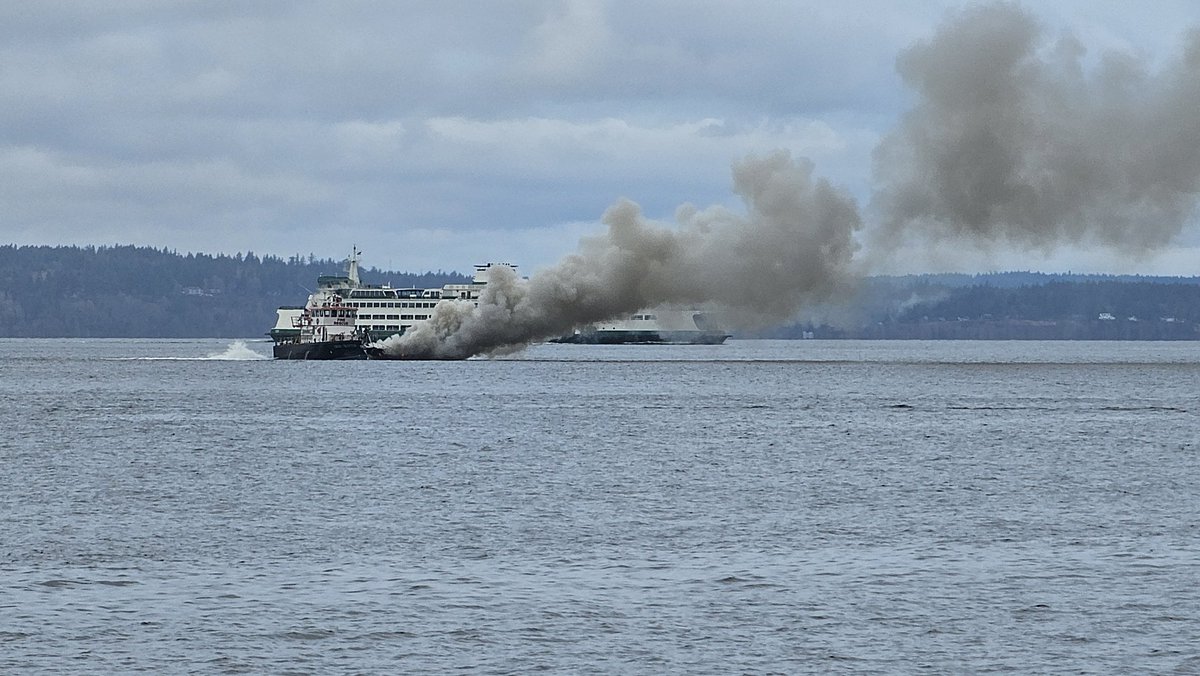 The <a href="/SeattleFire/">Seattle Fire Dept.</a> boat arrived and extinguished the flames on the boat. I'm not sure if they'll be able to keep it above water. <a href="/KarinaVargasTV/">Karina Vargas</a> will have the story on <a href="/komonews/">KOMO News</a>