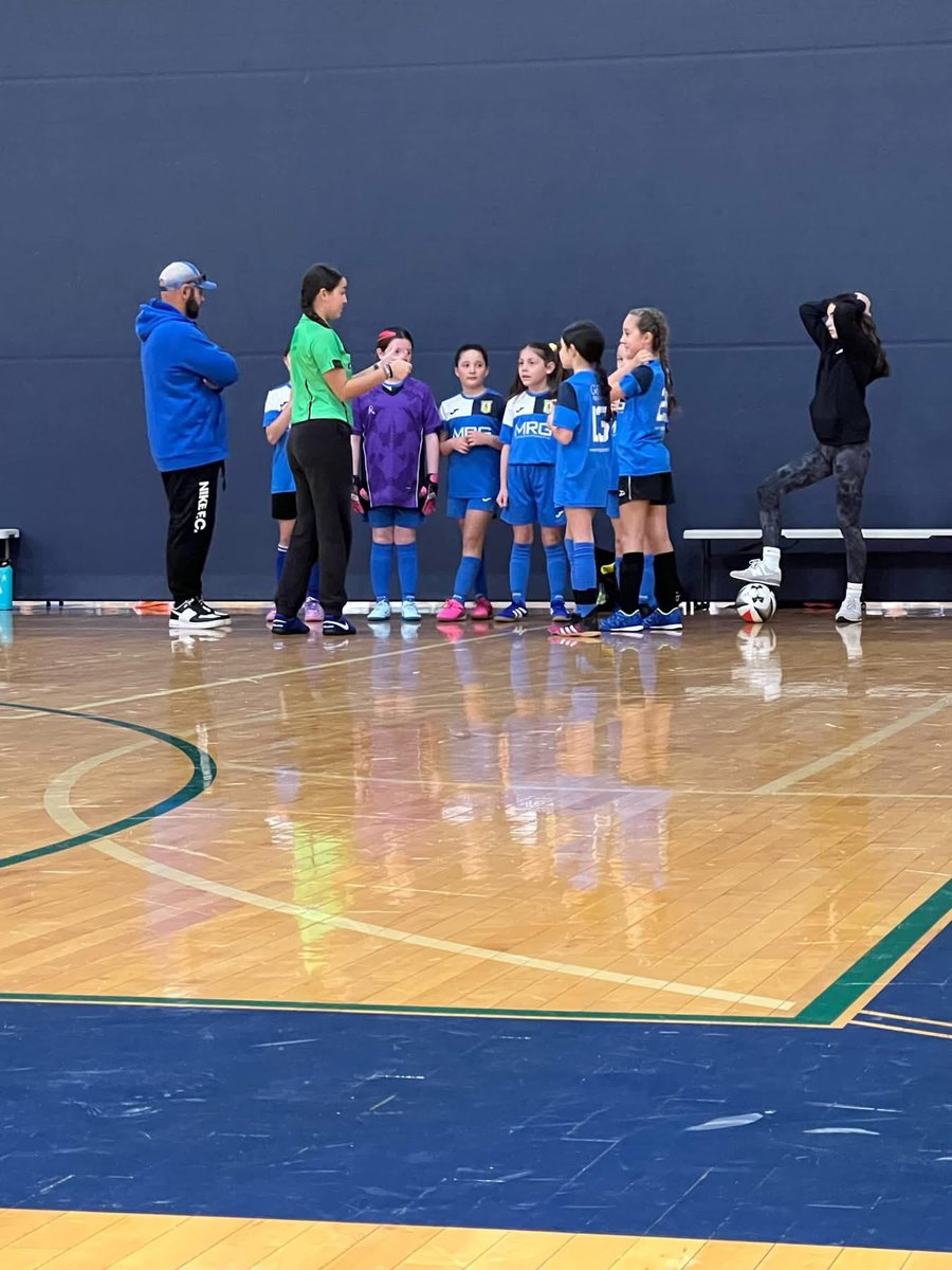 2015 girls playing their first futsal game.