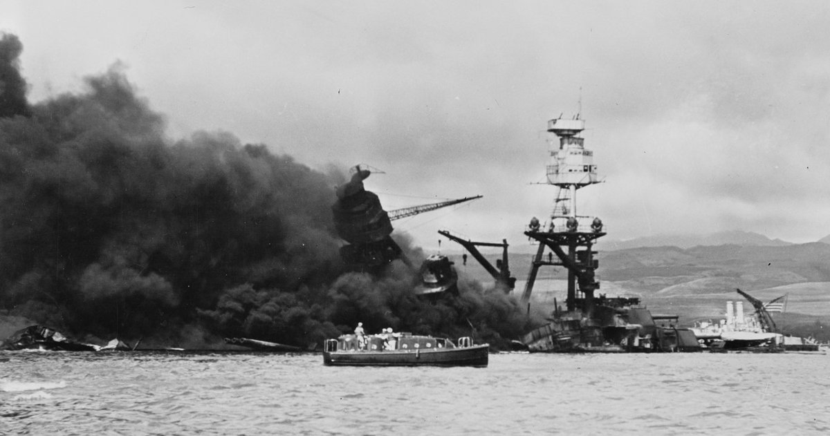 On December 8th, USS Arizona still burns at the waterline. #PearlHarbor83