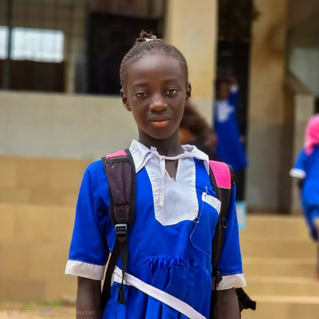 UNICEF's tweet photo. Horija, 10, from Gambia is happy to be back in school.

Thanks to UNICEF and partners, families of out-of-school children are receiving cash transfers to buy supplies and cover school-related expenses, helping children like Horija return to the classroom. https://t.co/tk0w3DNgMU