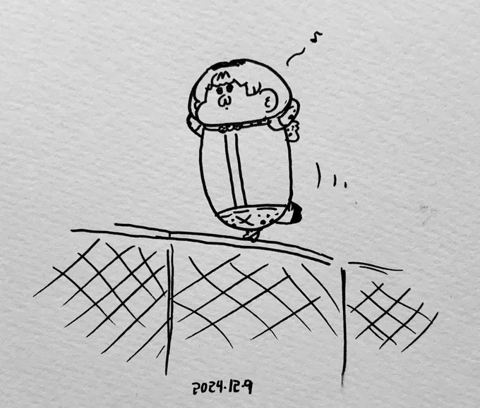 フェンスの上を歩くサーバルちゃん 