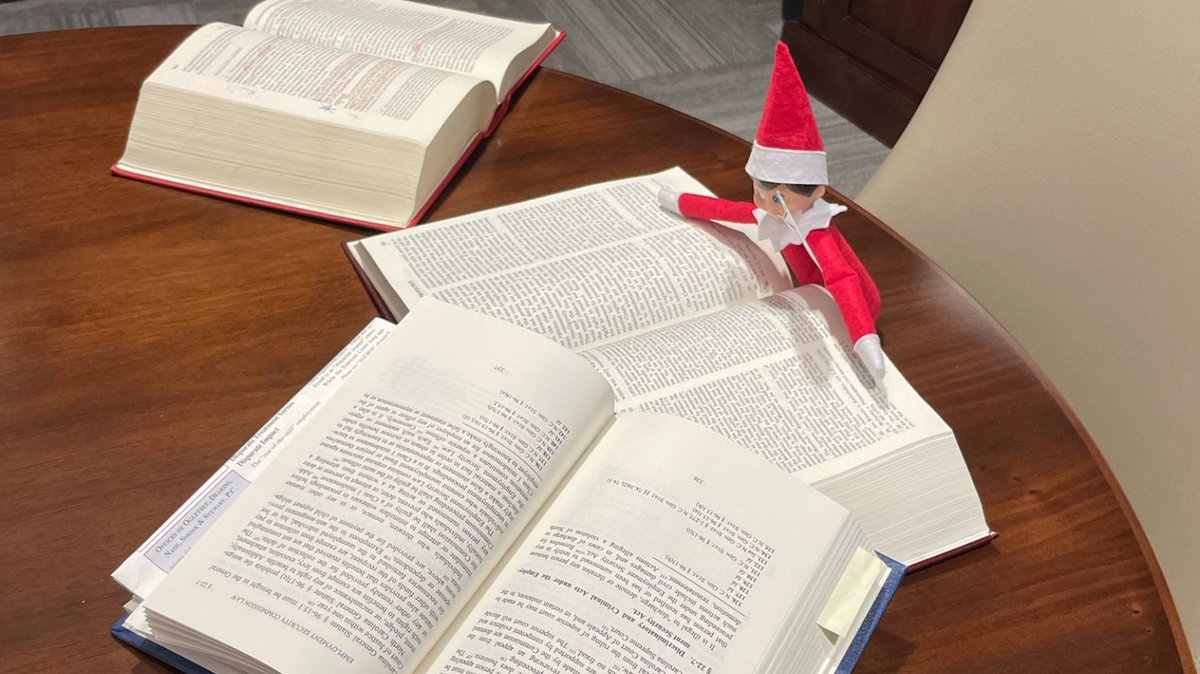 Buddy the Elf has turned our conference room into his own legal library! 📚🎄 From case law to constitutional law, he’s on a quest to settle some big questions—like, ‘Is the North Pole a democracy?’ Keep at it, Buddy—every great attorney starts somewhere! 😉 #ElfOnTheShelf