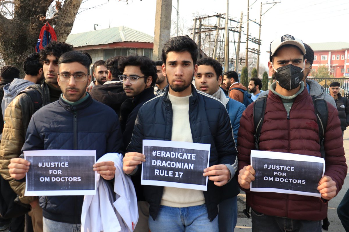 RisingKashmir's tweet photo. #inpics | Open Merit Doctors held Protest at GMC Srinagar, Demands justice. https://t.co/J0wxMCKXyx