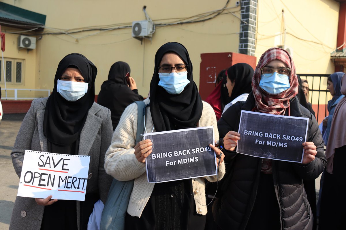 RisingKashmir's tweet photo. #inpics | Open Merit Doctors held Protest at GMC Srinagar, Demands justice. https://t.co/J0wxMCKXyx