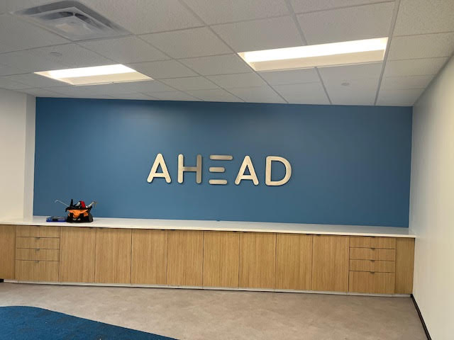 Dimensional brushed metal conference room sign mounted on drywall in Cincinnati  #Cincinnatismallbusiness #Cincinnatibusiness #dimensionalletters