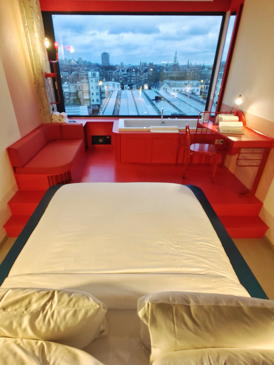 We've arrived in Amsterdam, and just checked into the ultra-cool <a href="/Volkshotel/">Volkshotel</a> . Check out our room, called the "Lost &amp; Found", where the the decor is just as incredible as the view! This unique room is adorned with discarded items recovered from around the neighborhood...