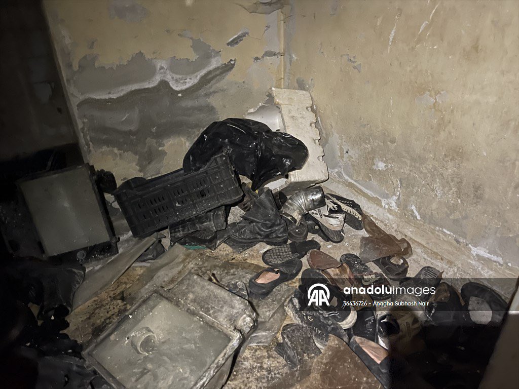 Reporters from Anadolu, following Syrian White Helmet rescue teams, found rooms filled with hundreds of discarded shoes and other items of clothing in Assad’s Sednaya prison.