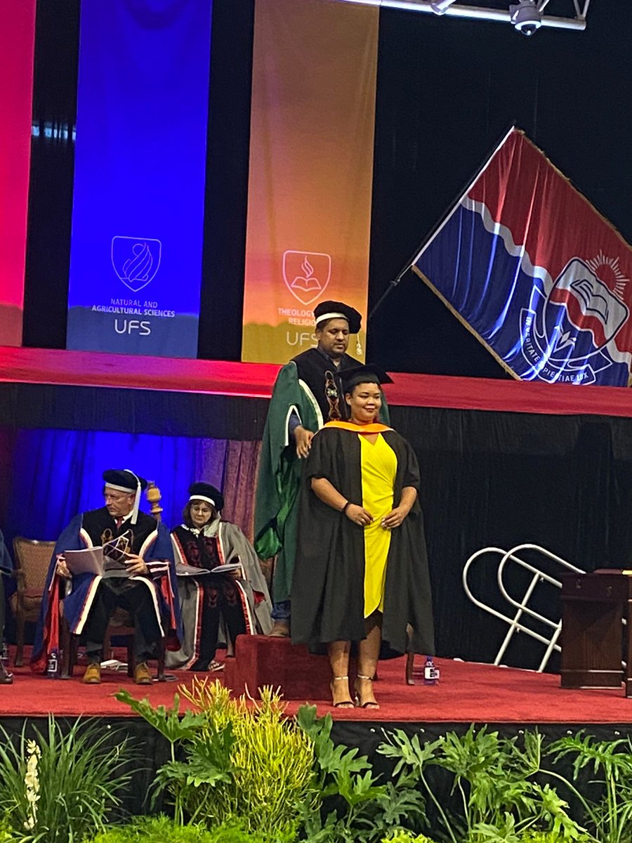 UFSweb's tweet photo. Prof Mogomme Masoga, Dean of the Faculty of Humanities, is now conferring degrees on the graduands. Here he is with Suzelle Townsend, who is the only graduate to receive a Postgraduate Diploma in Governance and Political Transformation in this session.
#UFSGraduation2024 https://t.co/tL4dWflPwO