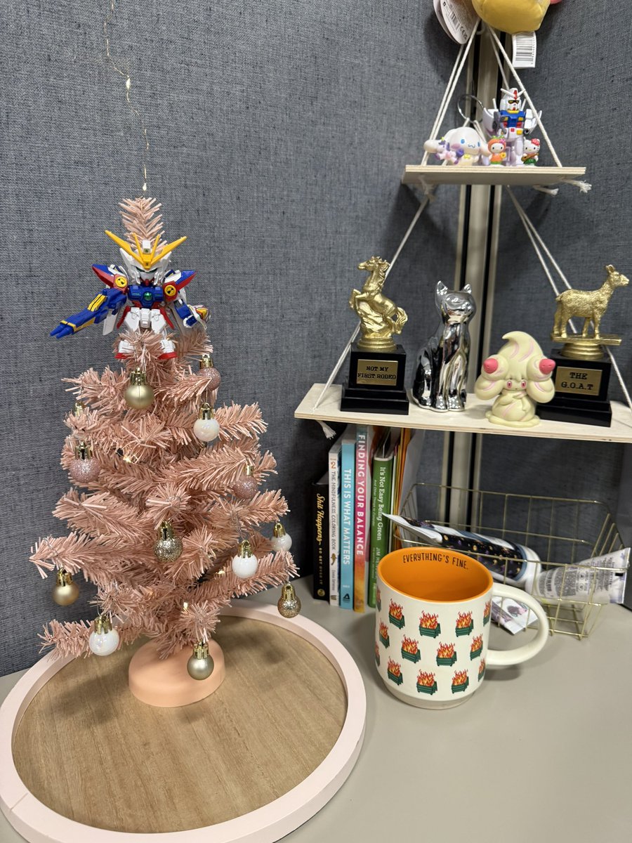 ItMacklyn's tweet photo. Got a mini Christmas tree with a full-sized Gundam standing guard! 🎄🤖 The holidays just got a lot more epic at work. #GundamChristmas #FestiveBuilds #HolidayCheer https://t.co/0DtgUMqJhO