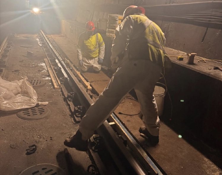 wmata's tweet photo. Over the weekend, #YourMetro team was busy on the Blue &amp; Orange lines:

▶️ Poured concrete for grout pad maintenance.  
▶️ Removed bolts from restraining rails using grinders &amp; torches.

These efforts aim to improve track stability &amp; safety. Thanks for your patience! #wmata https://t.co/DkHuQI4dap